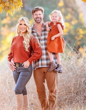 Slade Smiley with his partner and daughter.